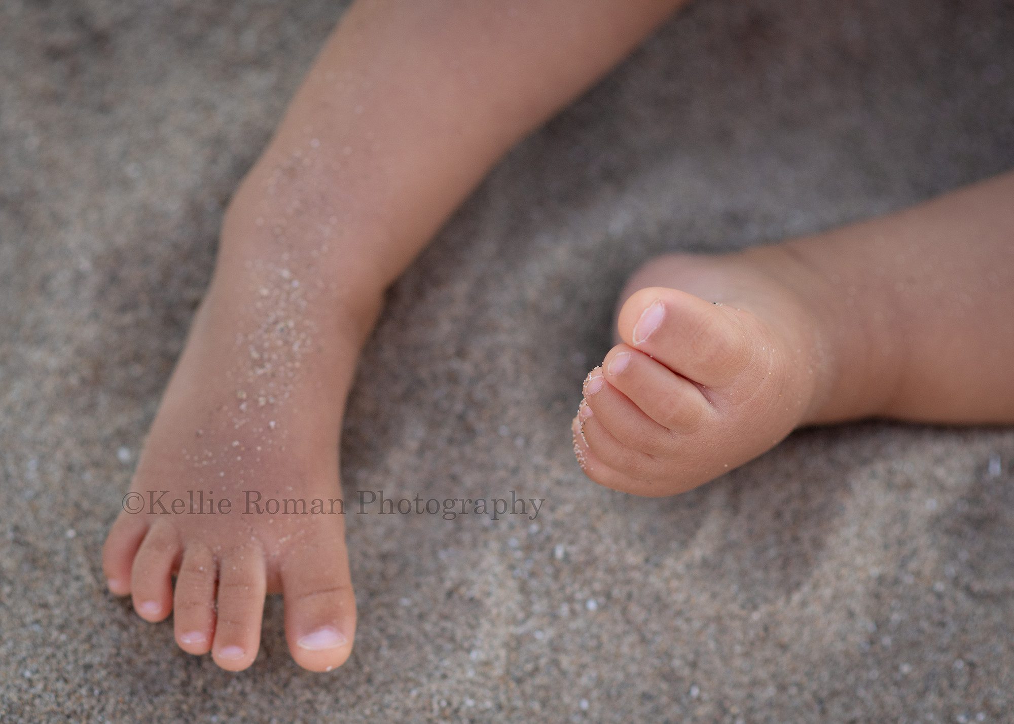beach cake smash a close up shot of a little girls feet onto of a sandy beach in kenosha Wisconsin