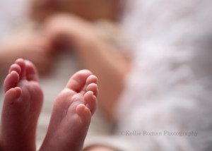 rainbow baby a close up image of a newborn boys feet in a milwaukee photography studio